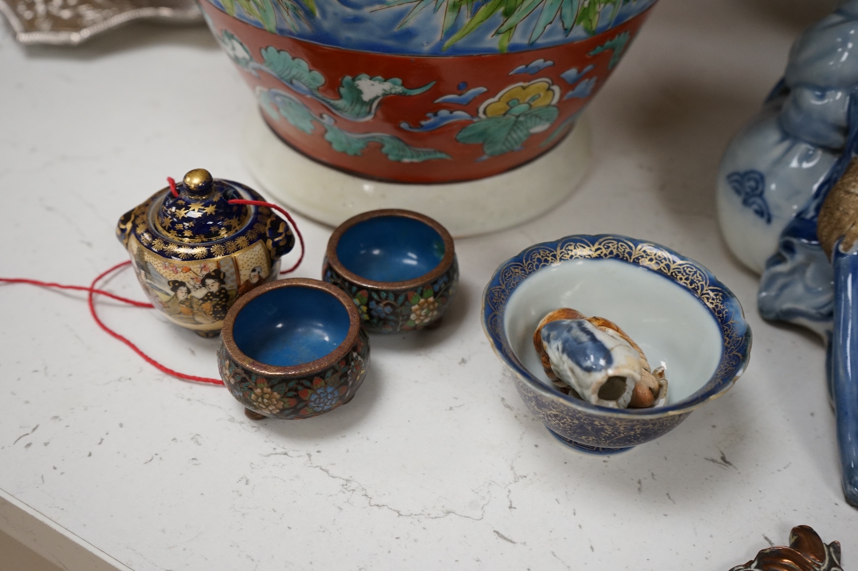 A collection of mostly Chinese and Japanese ceramics to include famille rose, satsuma, kutani etc. tallest 45cm